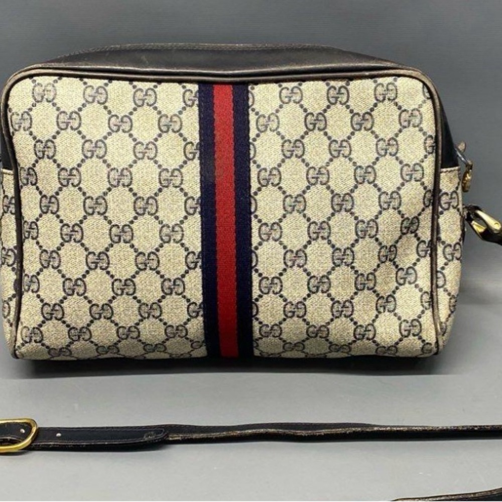 Authentic Gucci vintage navy GG supreme sherry lime shoulder bag.